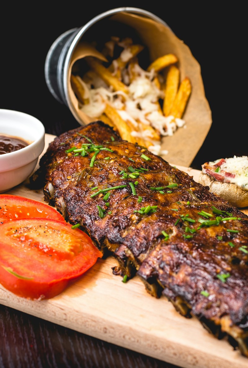 Carved Prime meats in stainless catering tray