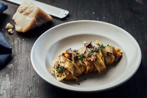 Wood-fired artisan bread with herbs and parmesan